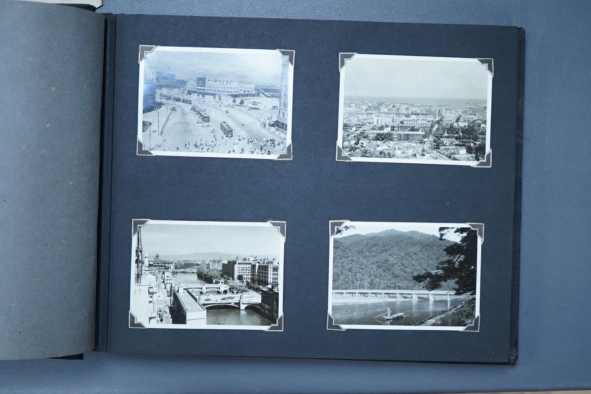 A Japanese photograph album, late 1940's to include banknotes and a telegram, together with a cigarette case